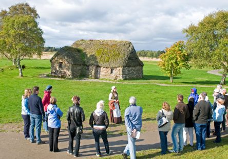 Tour Group At The Old Leanach Farmhouse Being Guided Round The Historic Culloden Battlefield Site. Image Shot 2008. Exact Date Unknown.